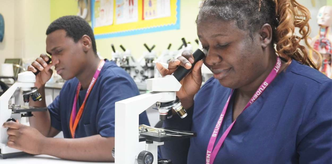 Dartford_Landscape_Health_Male_Female_Student_Looking_Through_Stethoscope