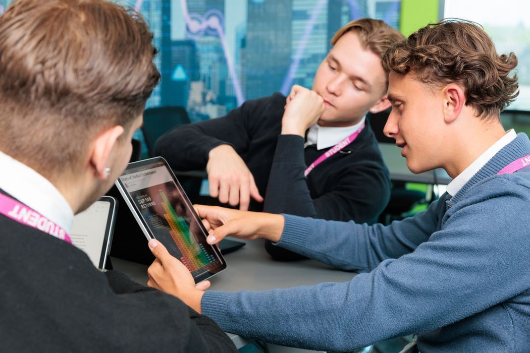 dartford-college-landscape-business-students-discussing-at-table-2026