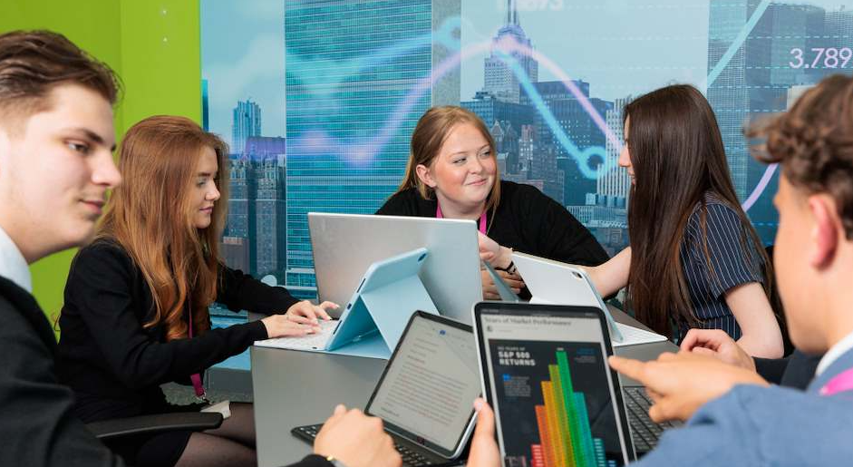 Business students discussing work