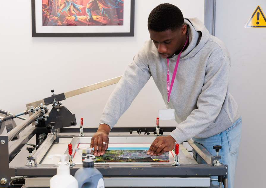 dartford-college-landscape-graphic-design-student-using-press-2026