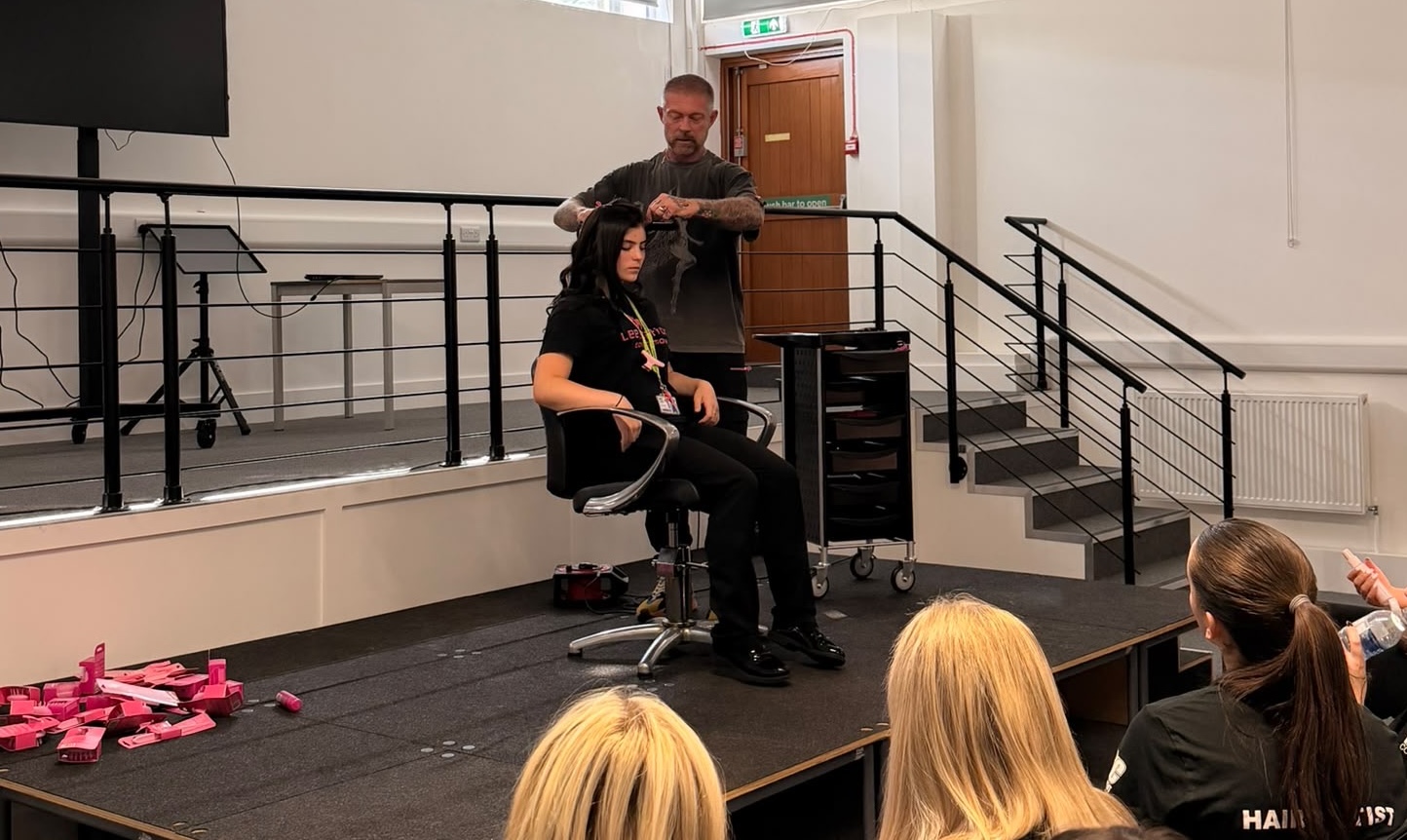 Lee Stafford demonstrating to hair dressing students 
