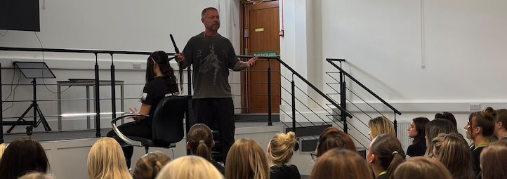 Lee Stafford demonstrating to hair dressing students 